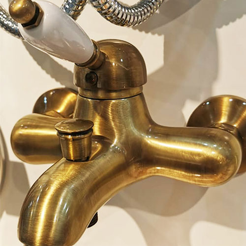 Brass plated water tap for architectural interiors
